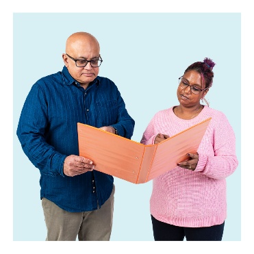 2 people reading a file together.
