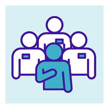 A person pointing to themself in front of 3 people with name badges.