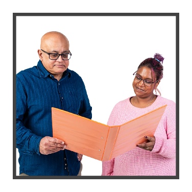 Someone supporting a person to read.